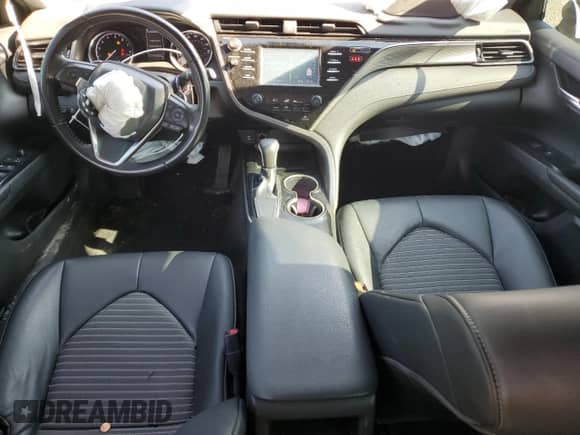 2019 Toyota Camry LE с VIN 4T1B11HK6KU735056, выставлен на аукционе Copart как лот 82243775 с пробегом 111 013 миль миль и Списание • Salvage title. История ставок и продаж доступна на DreamBid. Изображение 8.