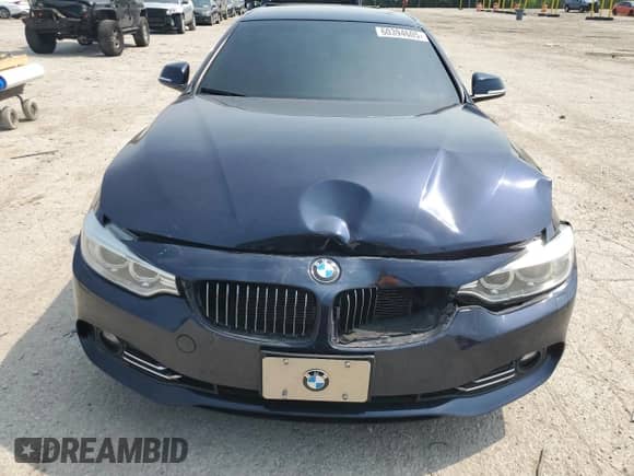 2015 BMW 4 Series 428i xDrive z VIN WBA3T1C55FP820640, wystawiony jako Copart lot #60394605 z przebiegiem 111 288 mil mil oraz Szkoda całkowita • Salvage title. Historia ofert i sprzedaży dostępna na DreamBid. Obrazek 5.