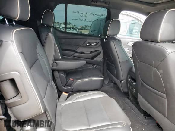 2023 Chevrolet Traverse Premier с VIN 1GNERKKW0PJ322299, выставлен на аукционе Copart как лот 84030715 с пробегом 49 801 миль миль и Списание • Salvage title. История ставок и продаж доступна на DreamBid. Изображение 11.