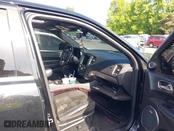 2018 Dodge Durango SRT with VIN 1C4SDJGJ5JC142443, listed as a IAAI auction lot 42401246 with 106,260 mi miles and . Bid and sale history available at DreamBid. Image 5.