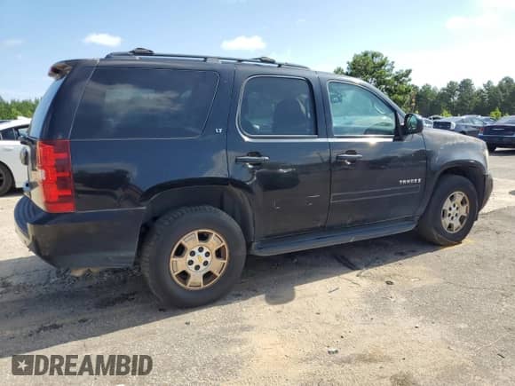 2009 Chevrolet Tahoe 1LT z VIN 1GNFC23J19R128555, wystawiony jako Copart lot #64804335 z przebiegiem 305 870 mil mil oraz Czysty tytuł • Clean title. Historia ofert i sprzedaży dostępna na DreamBid. Obrazek 3.