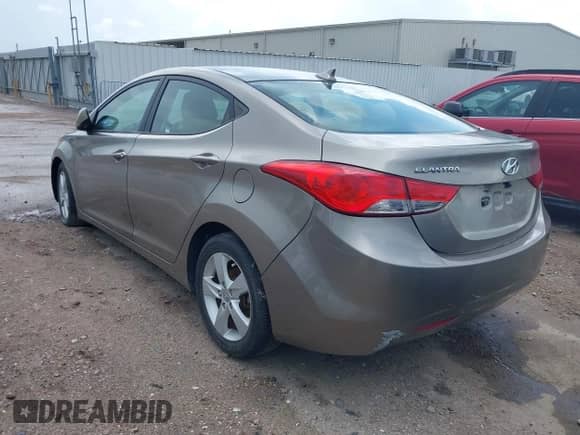 2013 Hyundai Elantra GLS with VIN 5NPDH4AEXDH331219, listed as a IAAI auction lot 42479752 with 90,372 mi miles and . Bid and sale history available at DreamBid. Image 3.