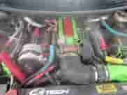 1994 Chevrolet Camaro Z28 z VIN 2G1FP22P4R2105947, wystawiony jako Copart lot #85064294 z przebiegiem 131 315 mil mil oraz Szkoda całkowita • Salvage title. Historia ofert i sprzedaży dostępna na DreamBid. Obrazek 12.