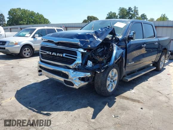 2020 Ram 1500 Lone Star z VIN 1C6RREFT8LN133969, wystawiony jako IAAI lot #43192733 z przebiegiem Nie podano mil oraz . Historia ofert i sprzedaży dostępna na DreamBid. Obrazek 17.