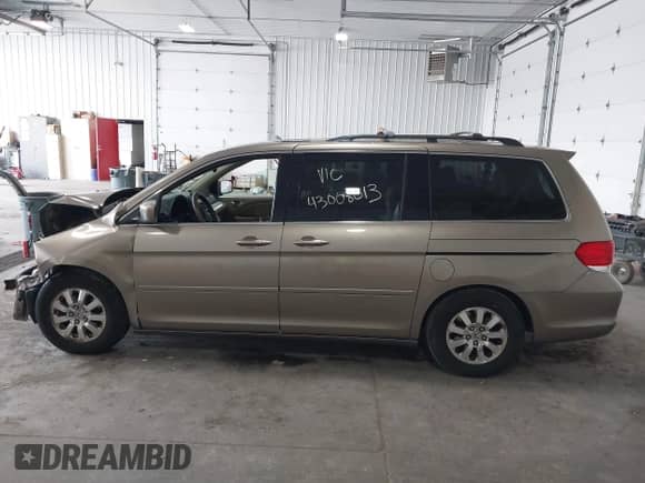 2008 Honda Odyssey EX-L with VIN 5FNRL38658B402974, listed as a IAAI auction lot 43008013 with 220,738 mi miles and . Bid and sale history available at DreamBid. Image 15.