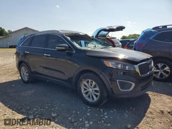 2018 Kia Sorento LX with VIN 5XYPG4A56JG390500, listed as a Copart auction lot 67140485 with 139,828 mi miles and Clean title. Bid and sale history available at DreamBid. Image 4.