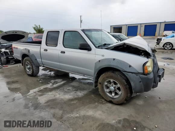 2003 Nissan Frontier XE with VIN 1N6ED29Y73C456401, listed as a Copart auction lot 69845955 with Not provided miles and Salvage title. Bid and sale history available at DreamBid. Image 4.