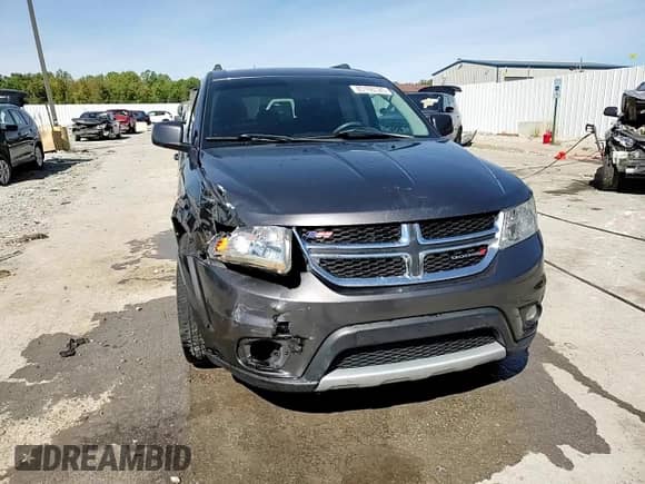 2015 Dodge Journey SXT with VIN 3C4PDDBG9FT646170, listed as a Copart auction lot 85193125 with 177,837 mi miles and Salvage title. Bid and sale history available at DreamBid. Image 14.