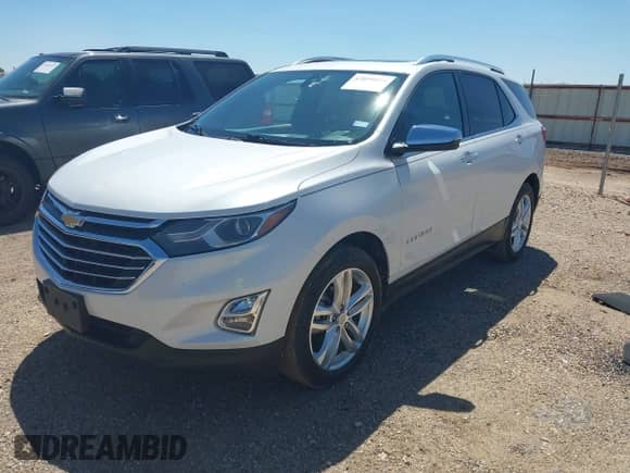 2018 Chevrolet Equinox Premier with VIN 2GNAXVEVXJ6104478, listed as a IAAI auction lot 43056014 with 82,627 mi miles and . Bid and sale history available at DreamBid. Image 2.
