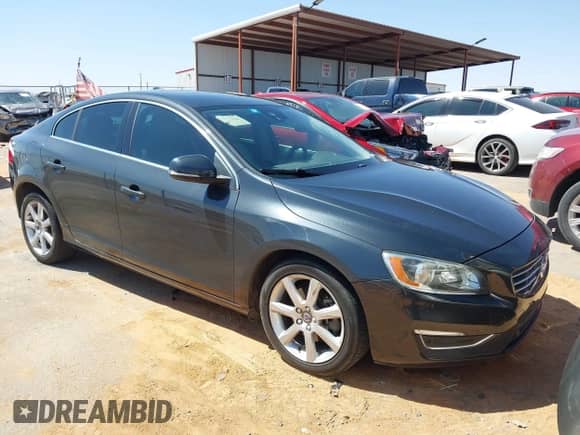2016 Volvo S60 T5 Drive-E Premier z VIN YV126MFK4G2409957, wystawiony jako IAAI lot #41993257 z przebiegiem 102 420 mil mil oraz . Historia ofert i sprzedaży dostępna na DreamBid. Obrazek 1.
