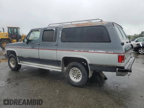1990 Chevrolet Suburban с VIN 1GNER16K4LF118555, выставлен на аукционе Copart как лот 58189665 с пробегом 77 432 миль миль и Чистый • Clean title. История ставок и продаж доступна на DreamBid. Изображение 2.