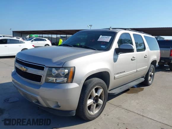2007 Chevrolet Suburban LTZ z VIN 3GNFC16J57G103628, wystawiony jako IAAI lot #42373026 z przebiegiem 293 570 mil mil oraz . Historia ofert i sprzedaży dostępna na DreamBid. Obrazek 21.