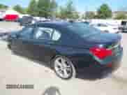 2015 BMW 7 Series with VIN WBAYG6C59FD383735, listed as a IAAI auction lot 42106255 with 107,936 mi miles and . Bid and sale history available at DreamBid. Image 3.