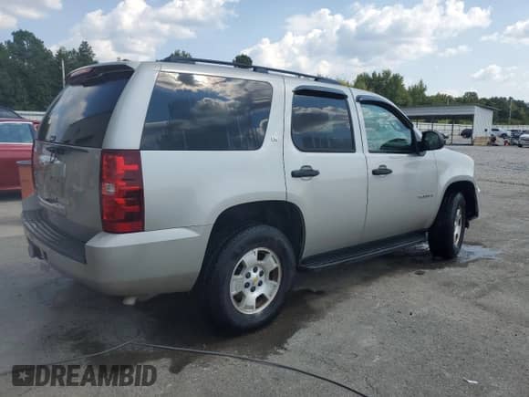 2009 Chevrolet Tahoe LS z VIN 1GNFC13C39R170818, wystawiony jako Copart lot #80545445 z przebiegiem 129 681 mil mil oraz Szkoda całkowita • Salvage title. Historia ofert i sprzedaży dostępna na DreamBid. Obrazek 3.