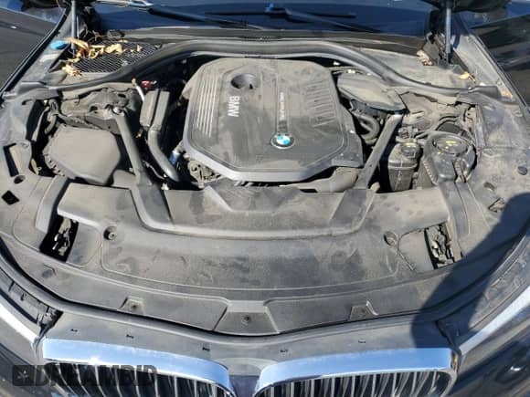 2018 BMW 7 Series 740i z VIN WBA7E2C59JG741921, wystawiony jako Copart lot #66907325 z przebiegiem 62 678 mil mil oraz Szkoda całkowita • Salvage title. Historia ofert i sprzedaży dostępna na DreamBid. Obrazek 11.