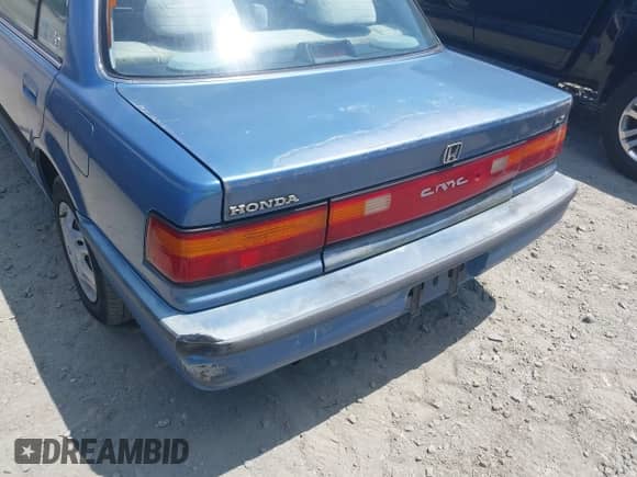 1991 Honda Civic z VIN 1HGED3656ML043956, wystawiony jako IAAI lot #42608632 z przebiegiem 163 524 mil mil oraz . Historia ofert i sprzedaży dostępna na DreamBid. Obrazek 12.