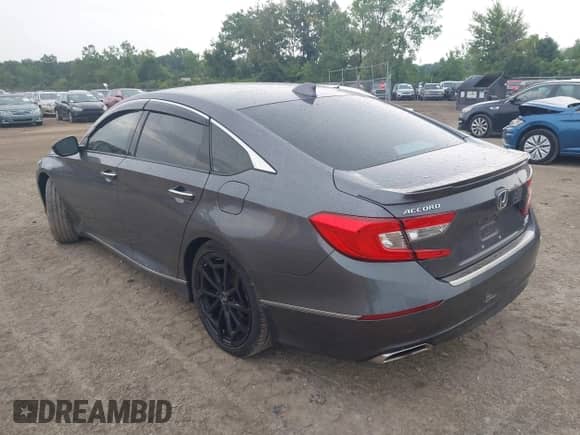 2019 Honda Accord Touring z VIN 1HGCV2F94KA016166, wystawiony jako IAAI lot #42754764 z przebiegiem 107 921 mil mil oraz . Historia ofert i sprzedaży dostępna na DreamBid. Obrazek 3.