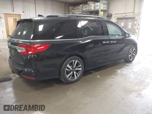 2019 Honda Odyssey Elite z VIN 5FNRL6H90KB013601, wystawiony jako IAAI lot #43286495 z przebiegiem 103 179 mil mil oraz . Historia ofert i sprzedaży dostępna na DreamBid. Obrazek 4.