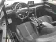 2021 Hyundai Veloster z VIN KMHT36AH9MU011200, wystawiony jako Copart lot #50986355 z przebiegiem 44 477 mil mil oraz Szkoda całkowita • Salvage title. Historia ofert i sprzedaży dostępna na DreamBid. Obrazek 8.