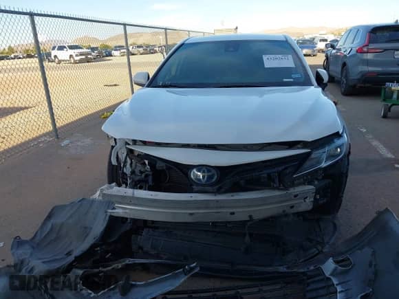 2021 Toyota Camry Hybrid LE with VIN 4T1C31AK3MU560440, listed as a IAAI auction lot 43202632 with 65,038 mi miles and . Bid and sale history available at DreamBid. Image 12.