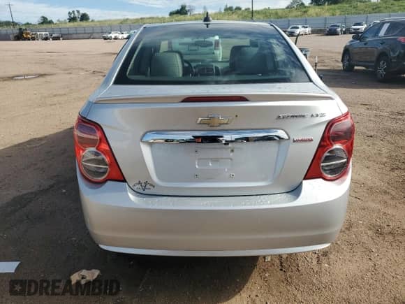 2015 Chevrolet Sonic LTZ with VIN 1G1JE5SB5F4130609, listed as a Copart auction lot 61953685 with 78,747 mi miles and Salvage title. Bid and sale history available at DreamBid. Image 6.