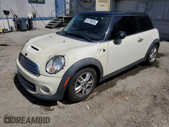 2013 MINI Hardtop with VIN WMWSU3C52DT680782, listed as a Copart auction lot 61779515 with 94,378 mi miles and Salvage title. Bid and sale history available at DreamBid. Image 1.