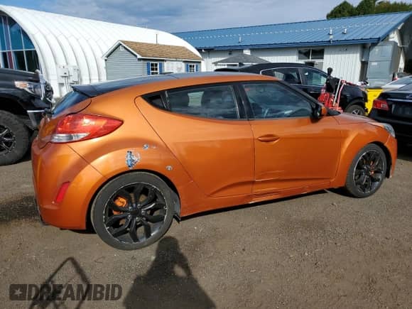 2013 Hyundai Veloster w/Black Int с VIN KMHTC6AD5DU178389, выставлен на аукционе Copart как лот 80652785 с пробегом 150 305 миль миль и Списание • Salvage title. История ставок и продаж доступна на DreamBid. Изображение 3.