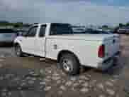 2001 Ford F-150 XL with VIN 1FTZX17231KF34373, listed as a Copart auction lot 68665815 with 161,328 mi miles and Clean title. Bid and sale history available at DreamBid. Image 2.