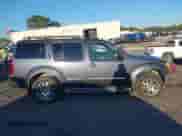 2011 Nissan Pathfinder LE with VIN 5N1AR1NB3BC606951, listed as a IAAI auction lot 43327489 with 234,098 mi miles and . Bid and sale history available at DreamBid. Image 14.