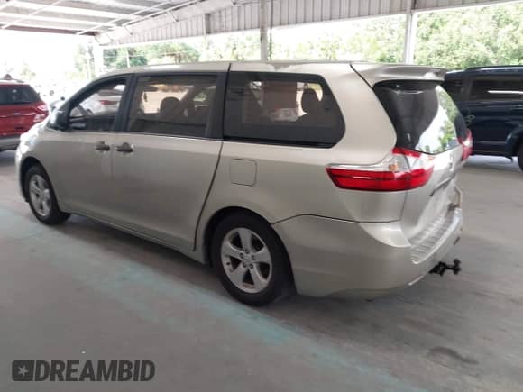2015 Toyota Sienna L with VIN 5TDZK3DCXFS572089, listed as a IAAI auction lot 43201327 with 120,641 mi miles and . Bid and sale history available at DreamBid. Image 3.