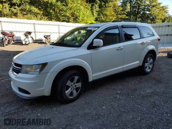 2011 Dodge Journey Mainstreet with VIN 3D4PG1FG0BT501662, listed as a Copart auction lot 71147435 with 134,882 mi miles and Salvage title. Bid and sale history available at DreamBid. Image 1.