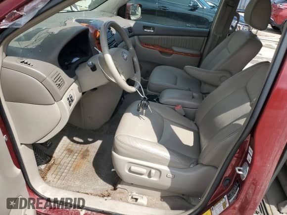 2010 Toyota Sienna XLE с VIN 5TDDK4CC9AS028466, выставлен на аукционе Copart как лот 67722755 с пробегом 166 938 миль миль и На запчасти • Non repairable. История ставок и продаж доступна на DreamBid. Изображение 7.