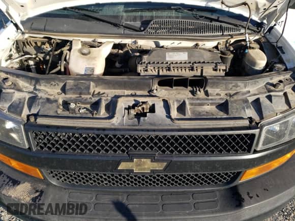 2018 Chevrolet Express Cargo с VIN 1GCWGAFP6J1184937, выставлен на аукционе Copart как лот 70963545 с пробегом 151 544 миль миль и Чистый • Clean title. История ставок и продаж доступна на DreamBid. Изображение 12.