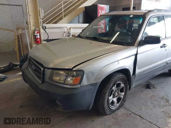 2004 Subaru Forester X with VIN JF1SG63604H737591, listed as a IAAI auction lot 42533905 with 188,163 mi miles and . Bid and sale history available at DreamBid. Image 6.