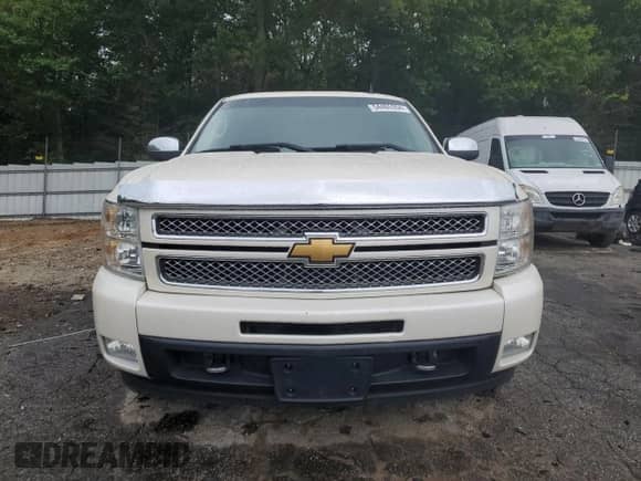 2012 Chevrolet Silverado 1500 LTZ with VIN 3GCPCTE04CG168708, listed as a Copart auction lot 54405354 with 156,487 mi miles and Salvage title. Bid and sale history available at DreamBid. Image 5.