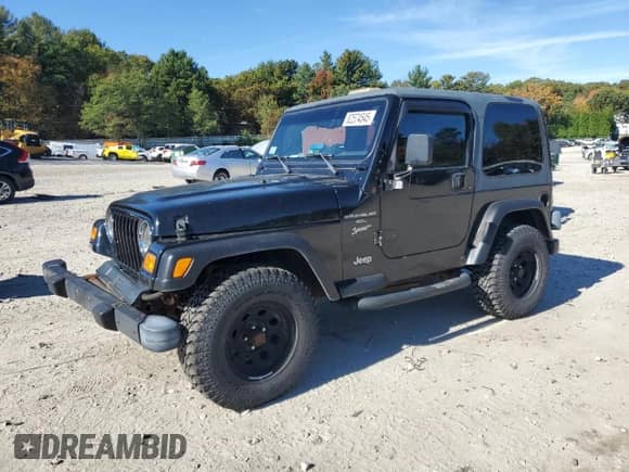 2000 Jeep Wrangler Sport with VIN 1J4FA49S1YP796600, listed as a Copart auction lot 82574545 with 128,340 mi miles and Clean title. Bid and sale history available at DreamBid. Image 1.