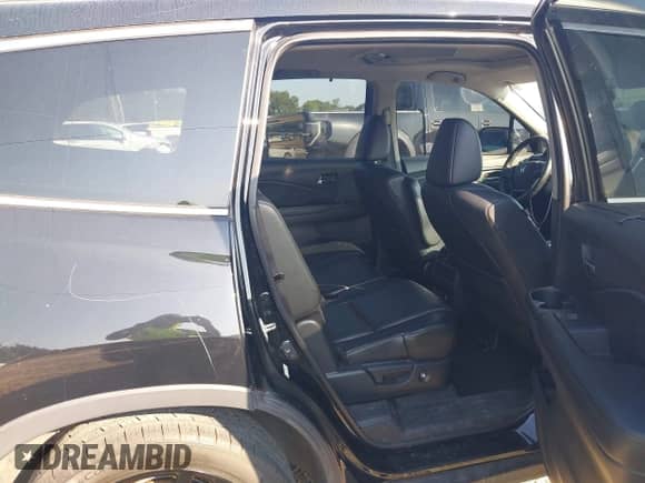 2016 Honda Pilot Touring z VIN 5FNYF5H9XGB007437, wystawiony jako IAAI lot #43208520 z przebiegiem 235 207 mil mil oraz . Historia ofert i sprzedaży dostępna na DreamBid. Obrazek 8.