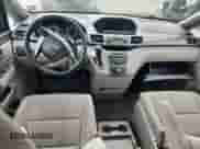 2015 Honda Odyssey LX with VIN 5FNRL5H24FB090989, listed as a Copart auction lot 85265575 with 129,952 mi miles and Salvage title. Bid and sale history available at DreamBid. Image 8.