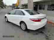 2015 Toyota Camry LE z VIN 4T1BD1FK3FU168482, wystawiony jako Copart lot #91081815 z przebiegiem 263 499 mil mil oraz Czysty tytuł • Clean title. Historia ofert i sprzedaży dostępna na DreamBid. Obrazek 3.