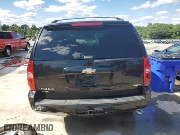 2011 Chevrolet Tahoe LT с VIN 1GNSCBE03BR130445, выставлен на аукционе Copart как лот 54971475 с пробегом 205 261 миль миль и Списание • Salvage title. История ставок и продаж доступна на DreamBid. Изображение 6.