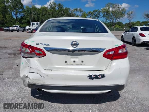 2016 Nissan Altima S z VIN 1N4AL3AP2GC258737, wystawiony jako IAAI lot #43444206 z przebiegiem 186 071 mil mil oraz . Historia ofert i sprzedaży dostępna na DreamBid. Obrazek 16.