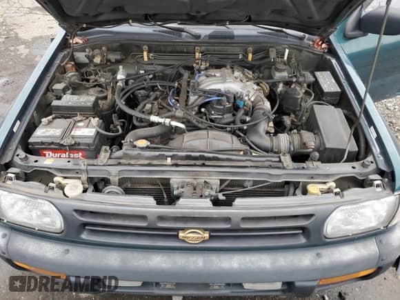 1997 Nissan Pathfinder XE z VIN JN8AR05Y2VW147485, wystawiony jako Copart lot #85934534 z przebiegiem 193 731 mil mil oraz Szkoda całkowita • Salvage title. Historia ofert i sprzedaży dostępna na DreamBid. Obrazek 14.