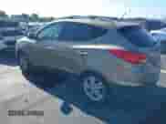 2013 Hyundai Tucson GLS with VIN KM8JU3AC0DU687400, listed as a IAAI auction lot 43191184 with 130,345 mi miles and . Bid and sale history available at DreamBid. Image 3.