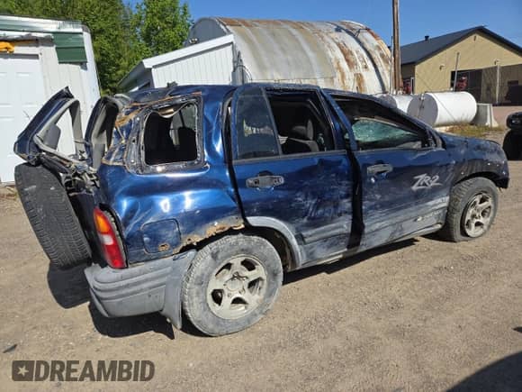 2004 Chevrolet Tracker ZR2 с VIN 2CNBJ734146911587, выставлен на аукционе Copart как лот 66702805 с пробегом Не указан миль и На запчасти • Non repairable. История ставок и продаж доступна на DreamBid. Изображение 3.