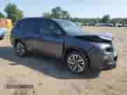 2025 Subaru Forester Touring Hybrid with VIN JF2SLSTD8SH401537, listed as a Copart auction lot 61878365 with 878 mi miles and Salvage title. Bid and sale history available at DreamBid. Image 4.