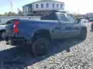 2019 Chevrolet Silverado 1500 Custom Trail Boss with VIN 1GCRYCEF0KZ261674, listed as a Copart auction lot 52117555 with 76,136 mi miles and Salvage title. Bid and sale history available at DreamBid. Image 3.