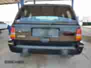 1994 Jeep Grand Cherokee Limited z VIN 1J4GZ78S5RC304501, wystawiony jako Copart lot #64632335 z przebiegiem 184 333 mil mil oraz Szkoda całkowita • Salvage title. Historia ofert i sprzedaży dostępna na DreamBid. Obrazek 6.