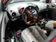 2012 Chevrolet Sonic LS with VIN 1G1JB6SH7C4116631, listed as a Copart auction lot 46794225 with 144,623 mi miles and Salvage title. Bid and sale history available at DreamBid. Image 8.