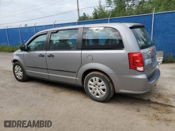 2015 Dodge Grand Caravan American Value with VIN 2C4RDGBG6FR565950, listed as a Copart auction lot 66317895 with 136,573 mi miles and Salvage title. Bid and sale history available at DreamBid. Image 2.