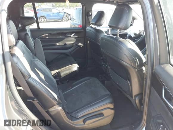 2023 Jeep Grand Cherokee Laredo with VIN 1C4RJKAG4P8101775, listed as a IAAI auction lot 43133852 with 72,579 mi miles and . Bid and sale history available at DreamBid. Image 8.